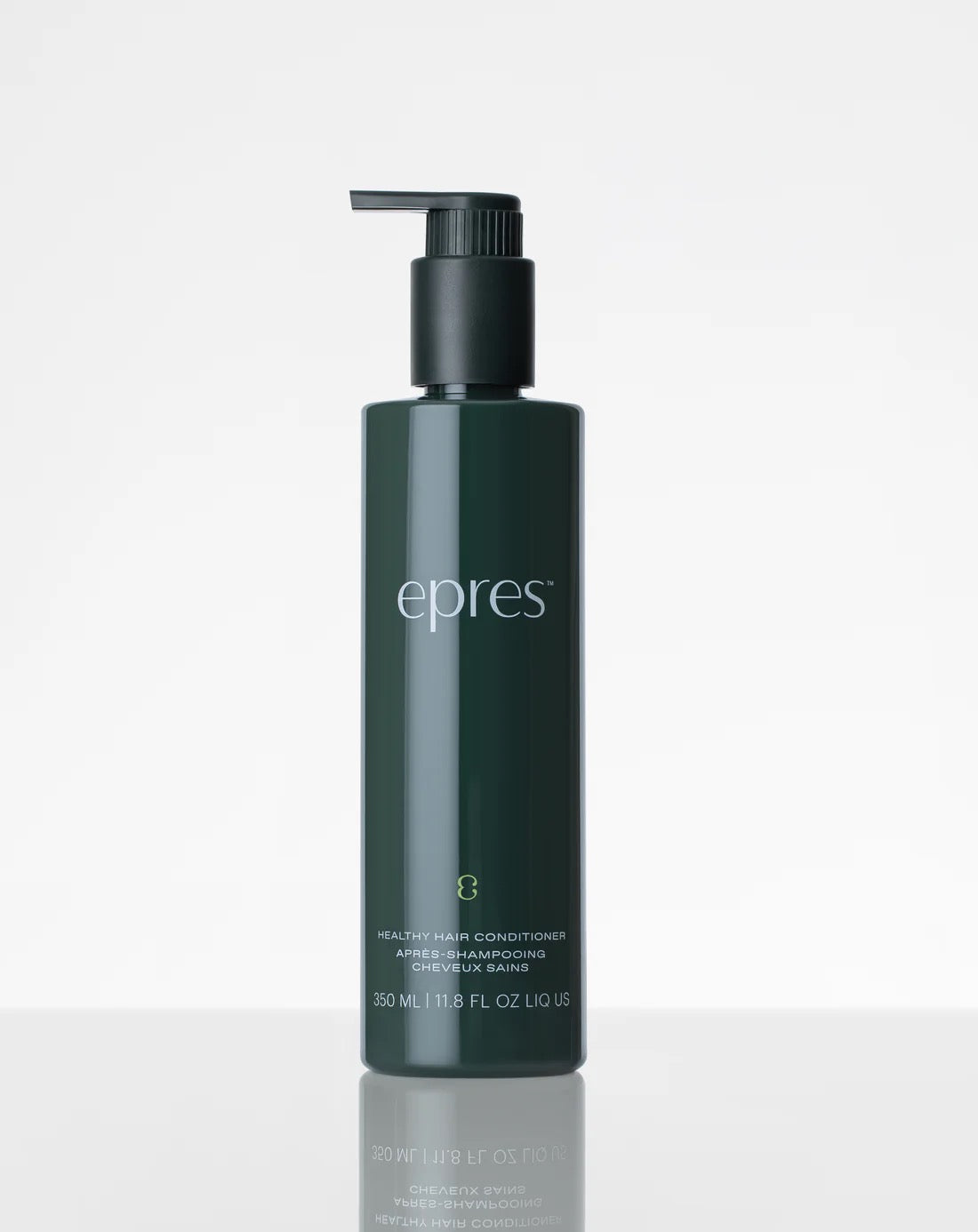 Dark green bottle with pump labeled 'epres' on a white background