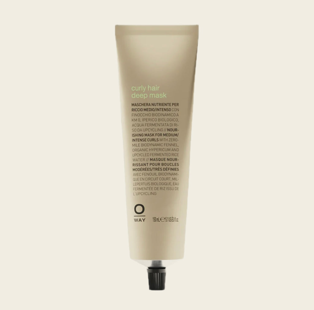 Tube of Oway Curly Hair Deep Mask on a beige background