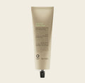 Tube of Oway Curly Hair Deep Mask on a beige background